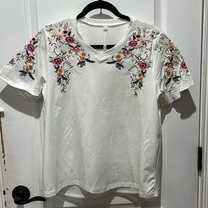 Embroidered T with sheer V back
